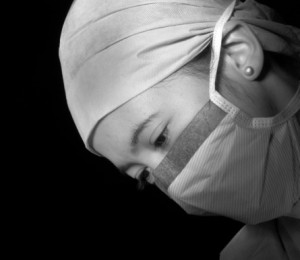 doctor operating surgical mask