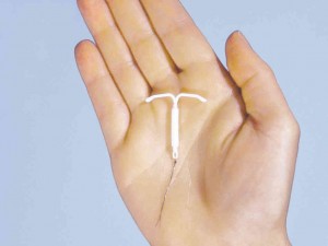 Mirena IUD in hand